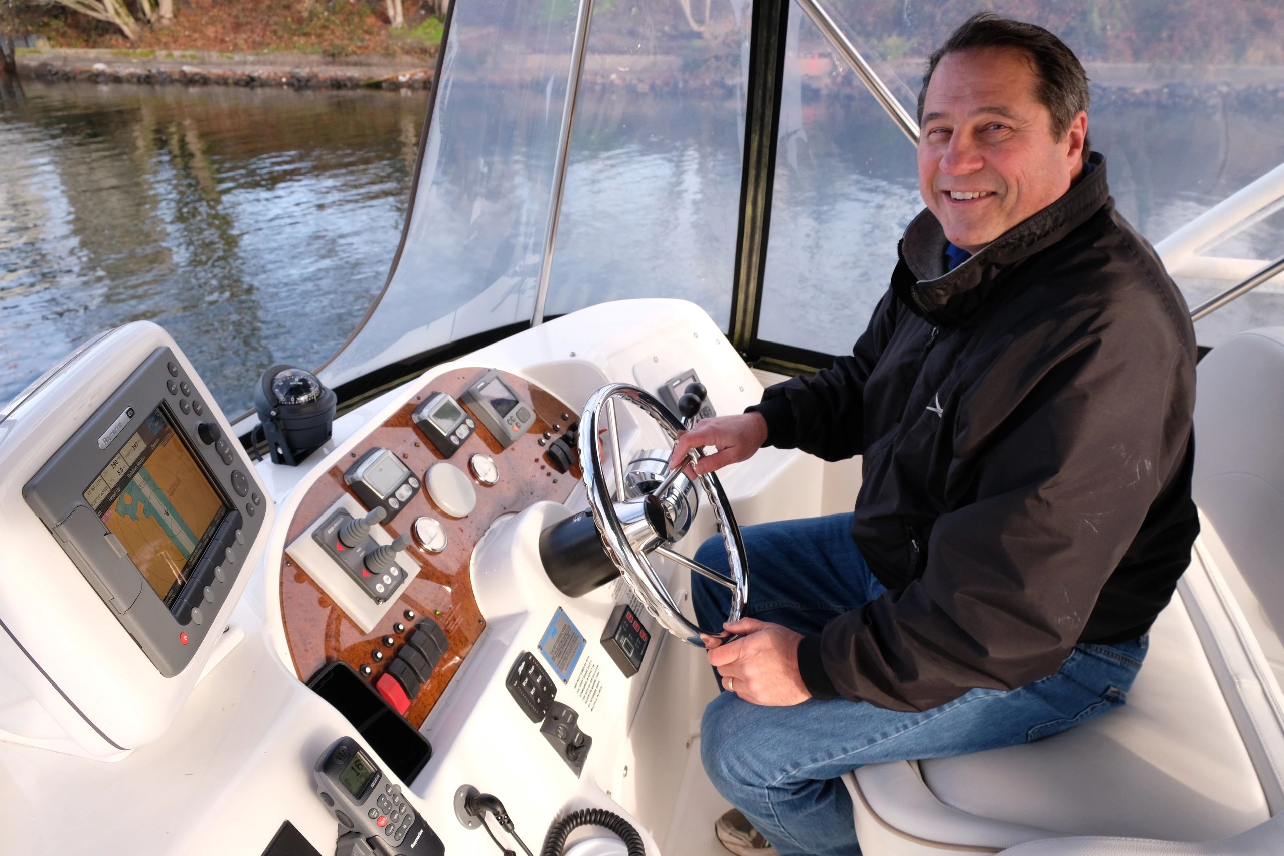 Captain Mike at the boat helm